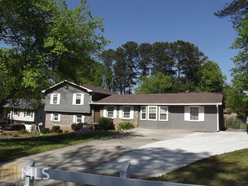 60 Chimney Rise Court Stockbridge, GA 30281 - Photo 1 of 1 a front view of a house with a garden