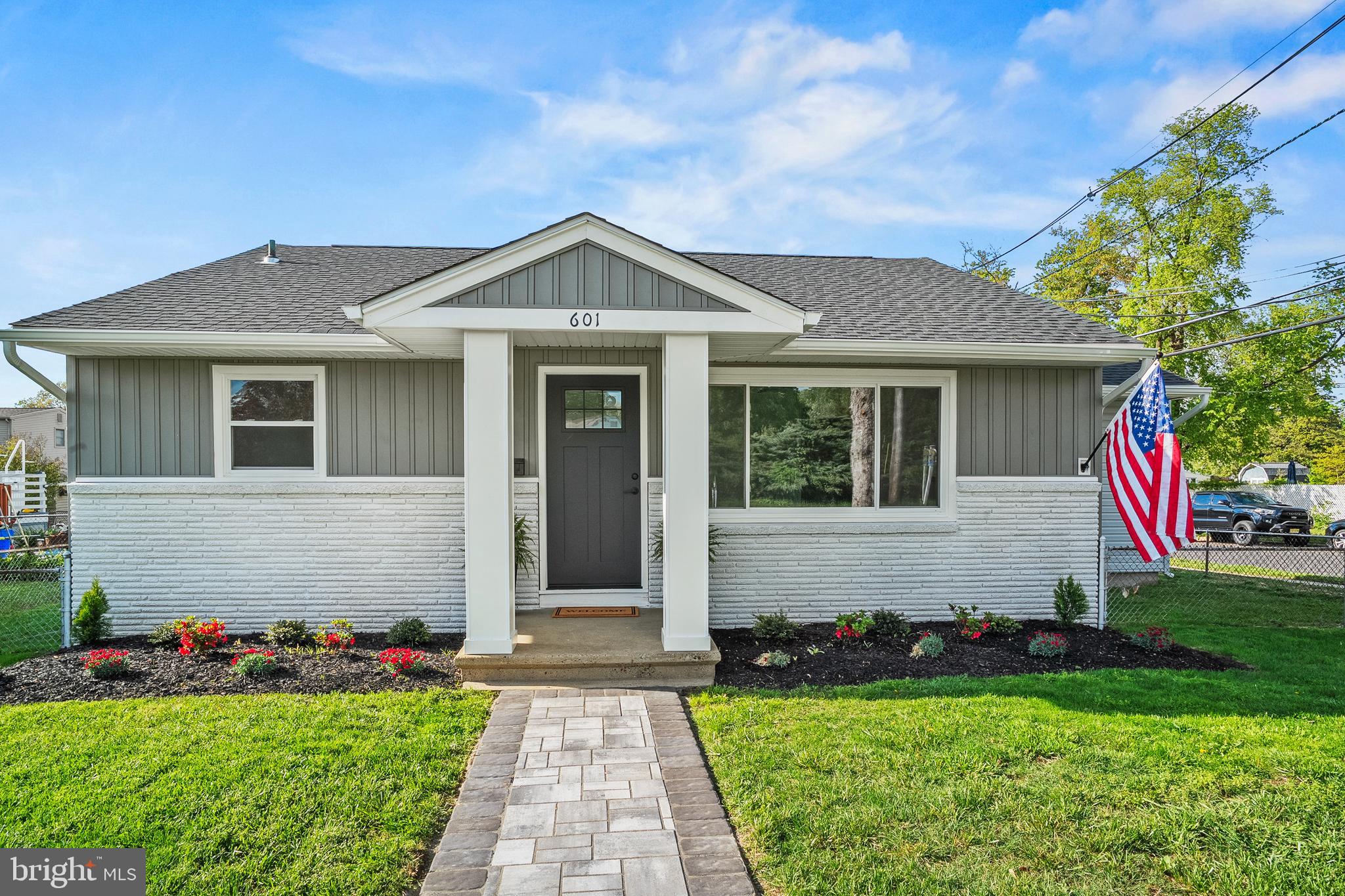 601 Evesham Avenue West Magnolia, NJ 08049 - Photo 1 of 20 a front view of a house with a yard
