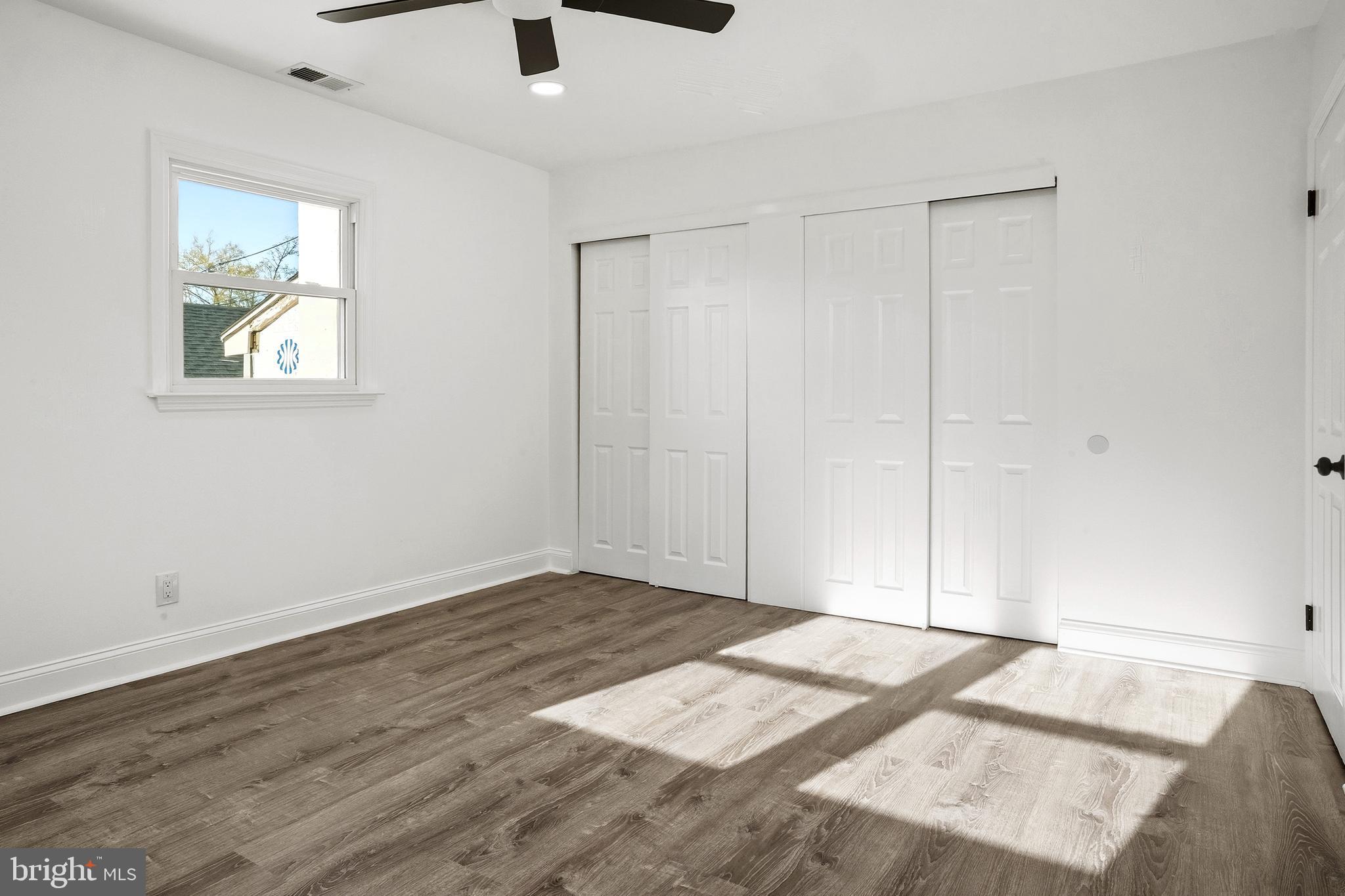 601 Evesham Avenue West Magnolia, NJ 08049 - Photo 16 of 20 a view of a livingroom with wooden floor and closet