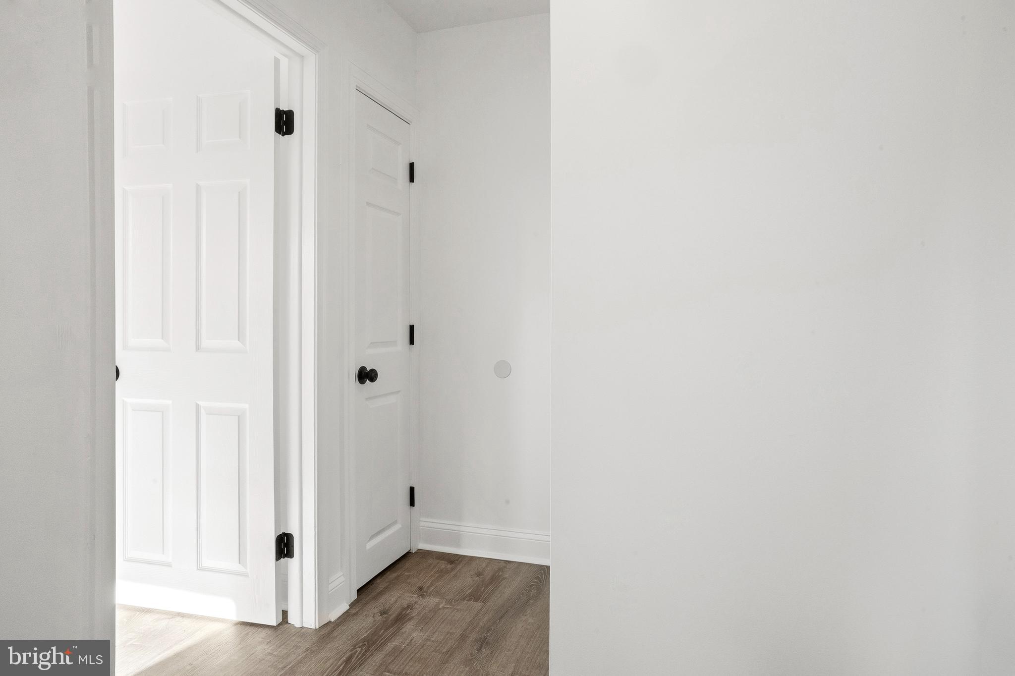 601 Evesham Avenue West Magnolia, NJ 08049 - Photo 17 of 20 a view of a hallway with wooden floor