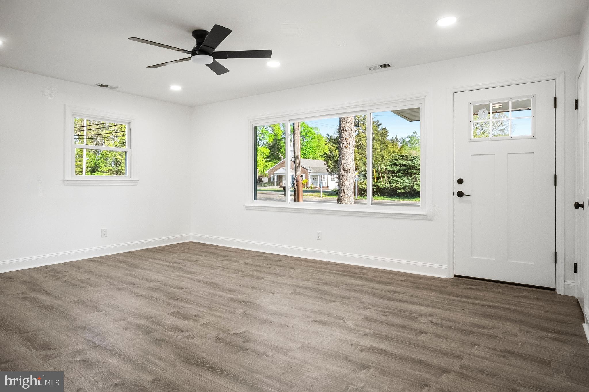 601 Evesham Avenue West Magnolia, NJ 08049 - Photo 6 of 20 a view of an empty room with a window