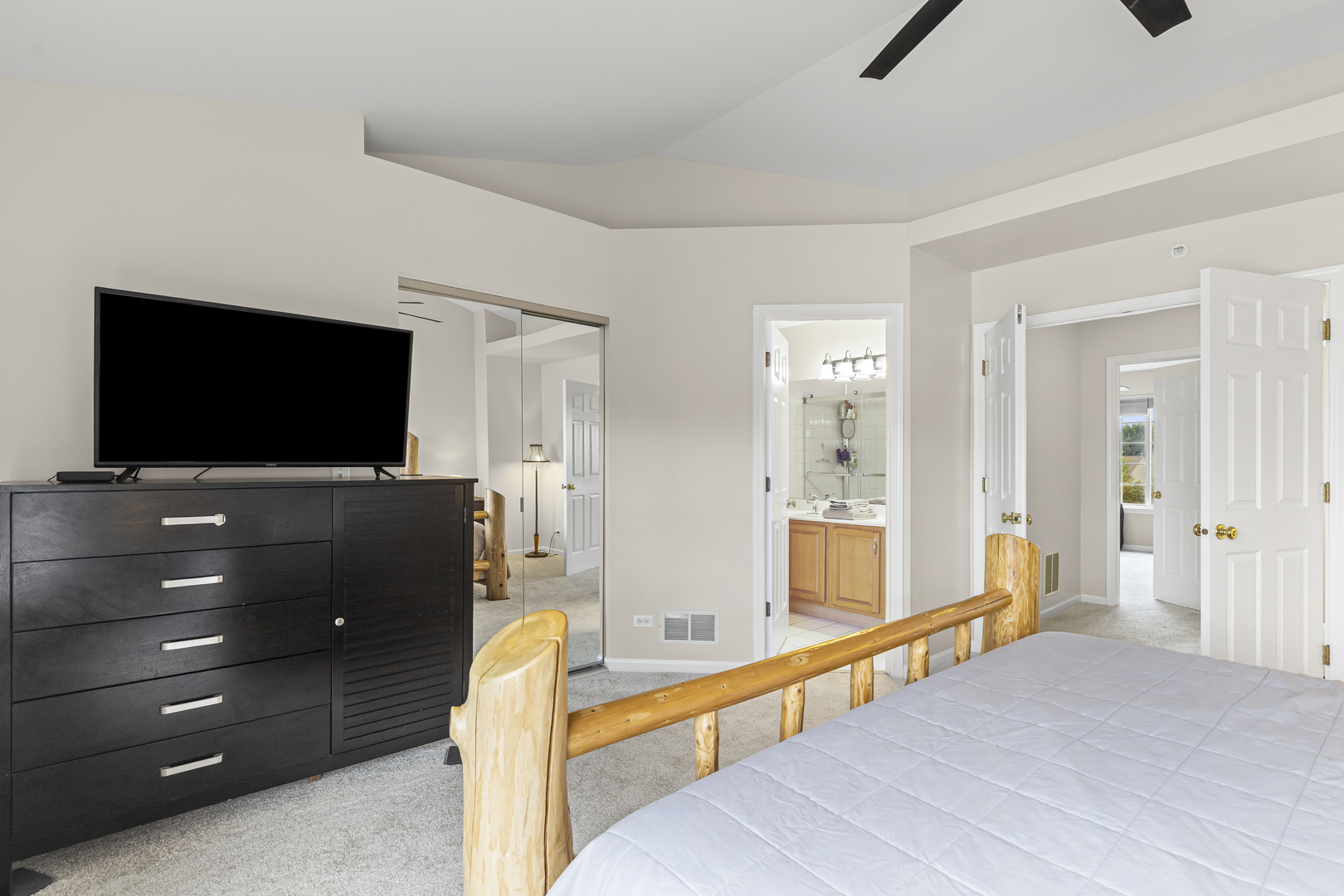 1719 Sienna Court Wheeling, IL 60090 - Photo 12 of 18 a living room with furniture and a flat screen tv