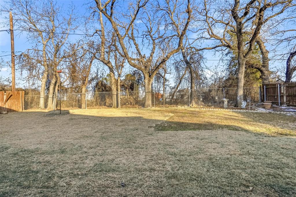 685 Cardinal Ridge Road Burleson, TX 76028 - Photo 39 of 40 a view of road with large trees