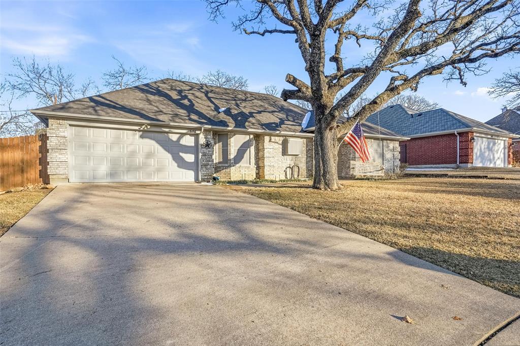 685 Cardinal Ridge Road Burleson, TX 76028 - Photo 7 of 40 a view of a house with a snow in the yard