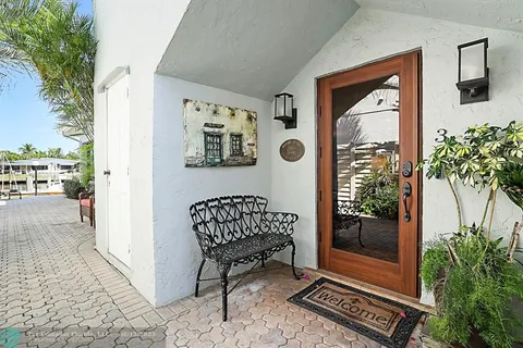 a view of a entryway door and chair