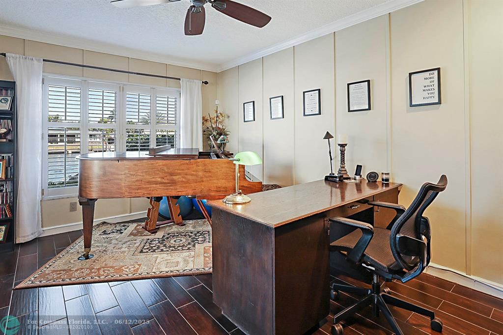 2743 Northeast 28th Court, Unit 3 Lighthouse Point, FL 33064 - Photo 31 of 56 a view of a dining room with furniture window and outside view