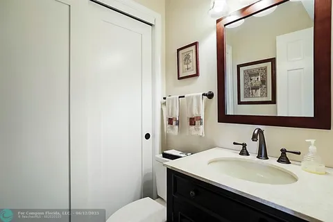 a view of a swimming pool with a couches in a patio