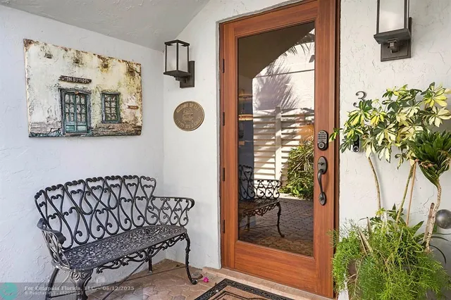 a aerial view of a house with swimming pool and a yard