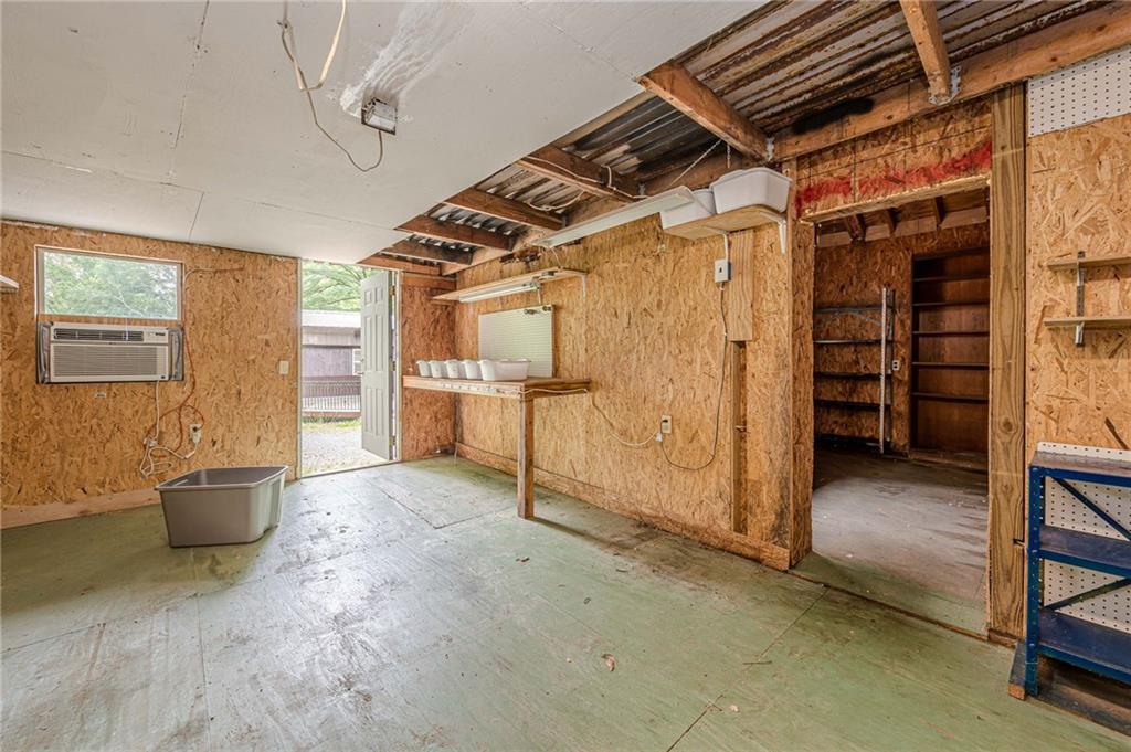 90 Valley Trail Southeast Acworth, GA 30101 - Photo 26 of 28 a view of empty room with wooden walls and windows
