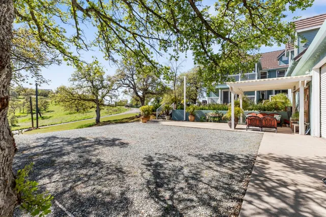 a view of a balcony with chairs