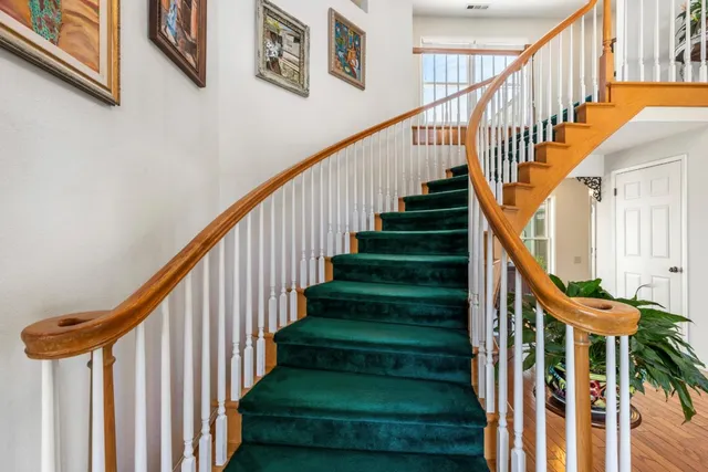 a view of a hallway with a white door