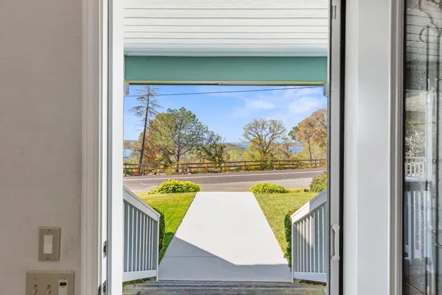 a view of swimming pool with a fireplace and painted walls
