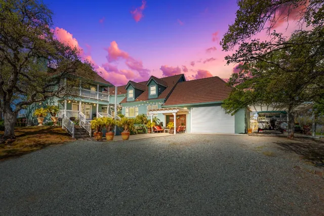 a view of a street with cars