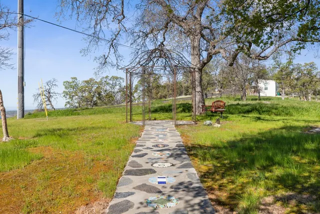a view of swimming pool with garden