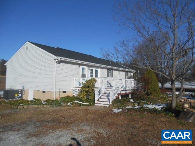 3232 Briery Road Keysville, VA 23947 - Photo 4 of 32 a front view of a house with garden