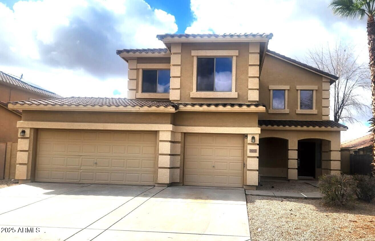 3057 East Pinto Valley Road San Tan Valley, AZ 85143 - Photo 1 of 17 a front view of a house with garage