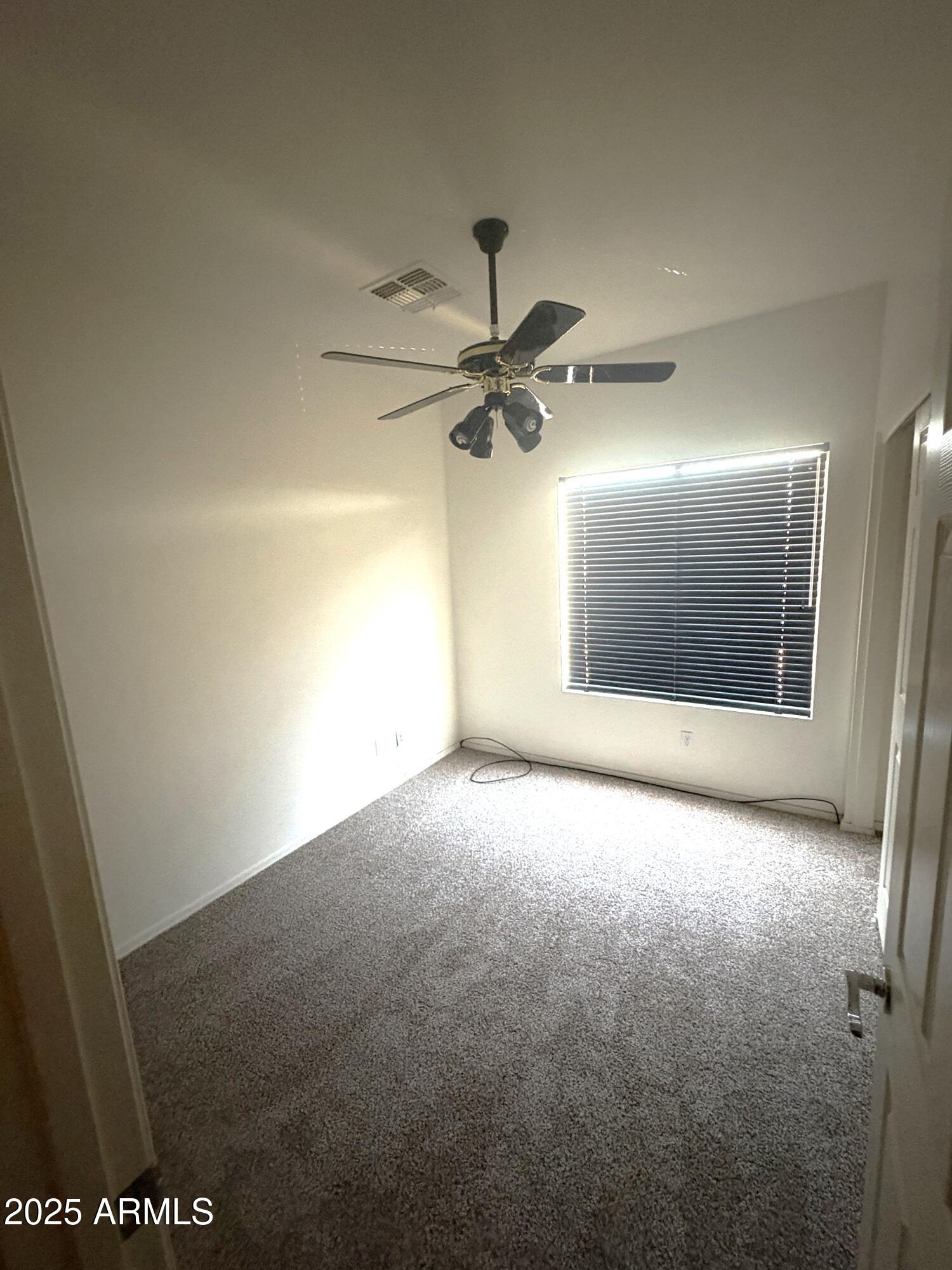 3057 East Pinto Valley Road San Tan Valley, AZ 85143 - Photo 14 of 17 a view of an empty room