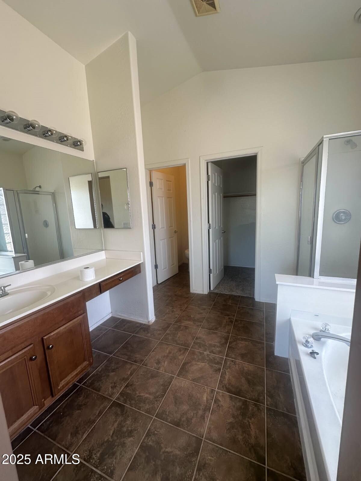 3057 East Pinto Valley Road San Tan Valley, AZ 85143 - Photo 10 of 17 a living room with stainless steel appliances furniture a sink and a refrigerator