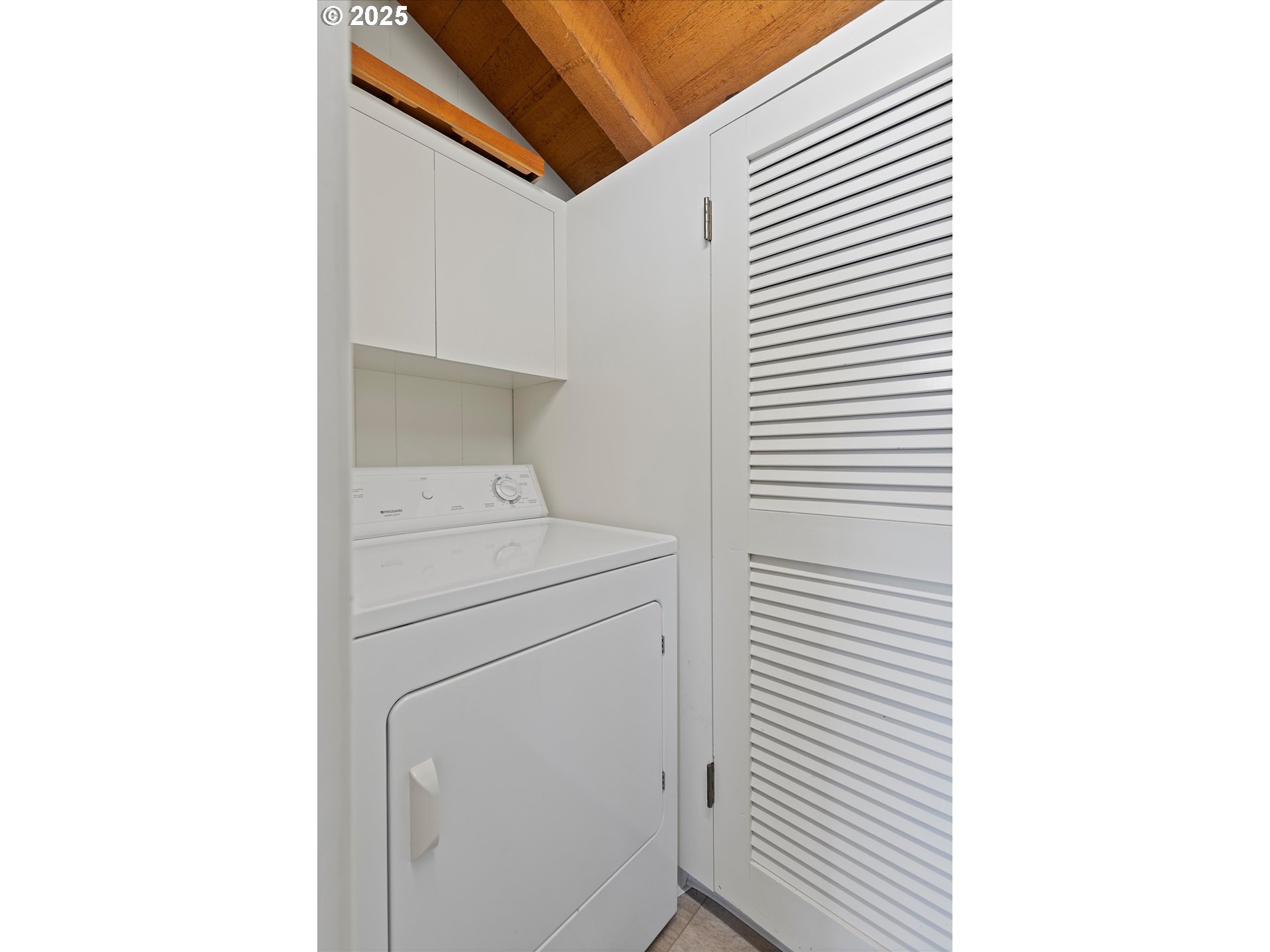 2871 Northeast East Devils Lake Road Otis, OR 97368 - Photo 14 of 48 a utility room with dryer and washer