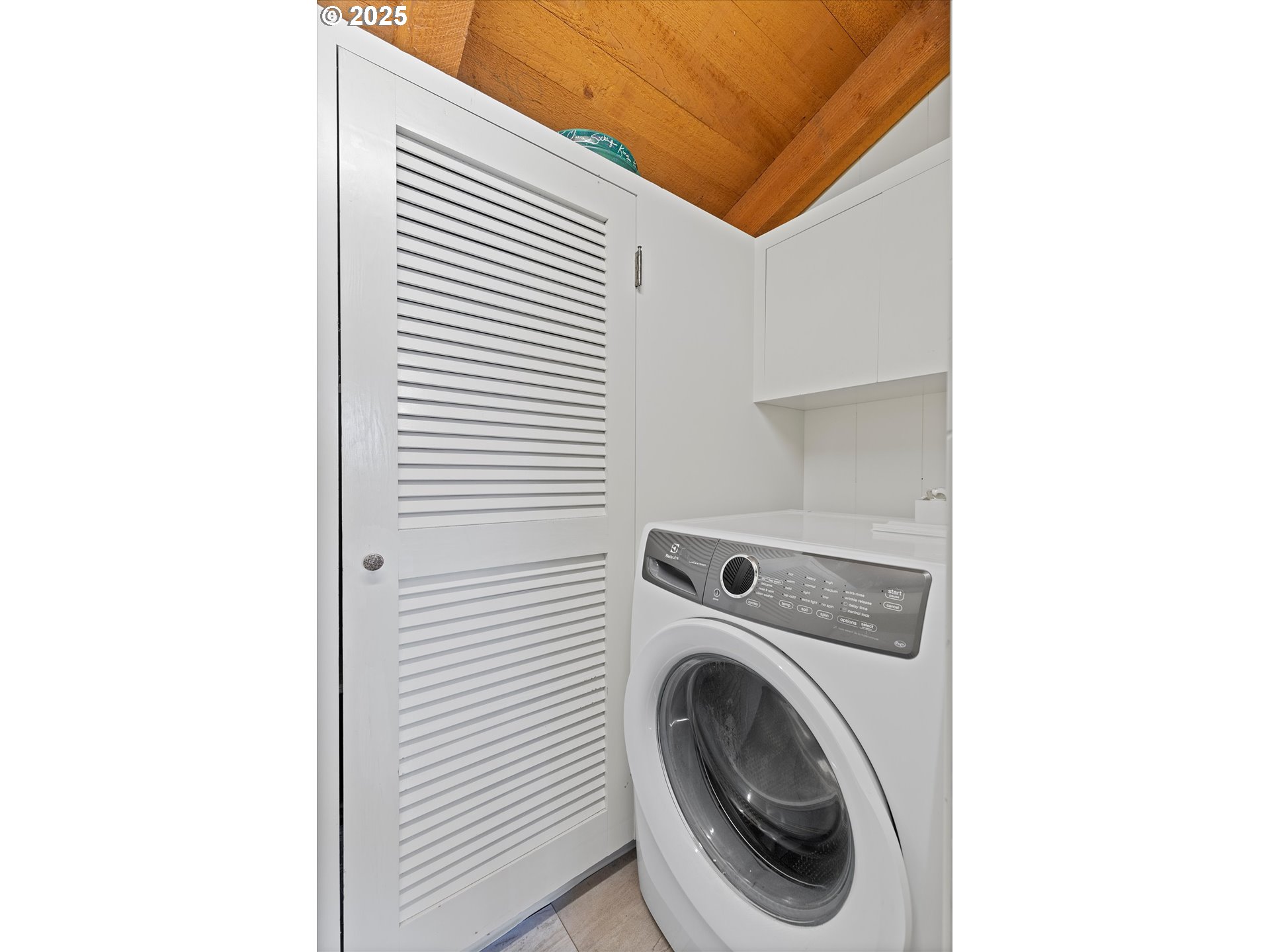 2871 Northeast East Devils Lake Road Otis, OR 97368 - Photo 15 of 48 a utility room with dryer and washer