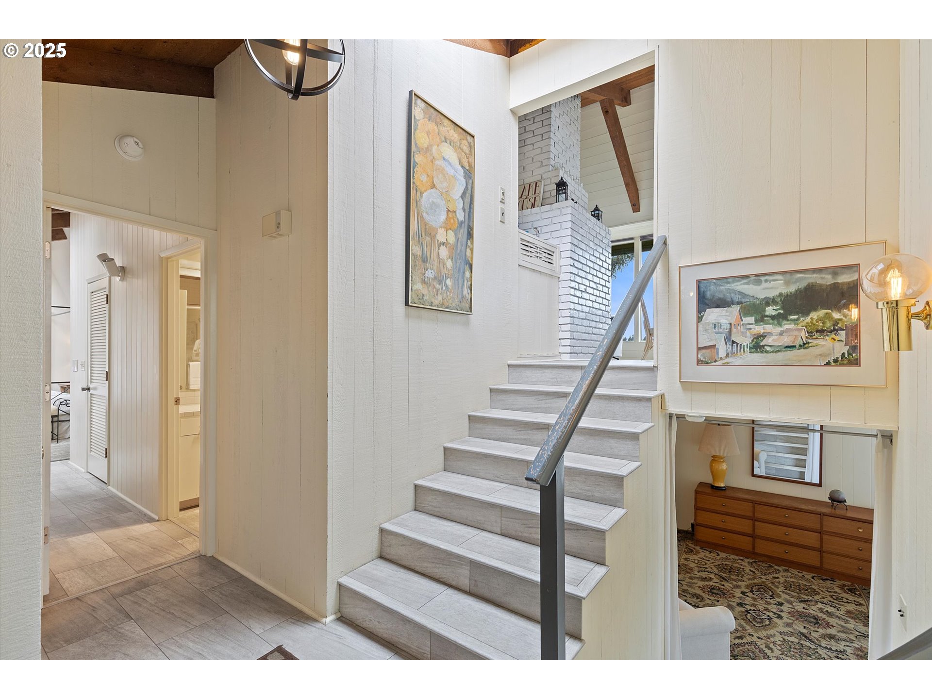 2871 Northeast East Devils Lake Road Otis, OR 97368 - Photo 2 of 48 a view of entryway with furniture and wooden floor