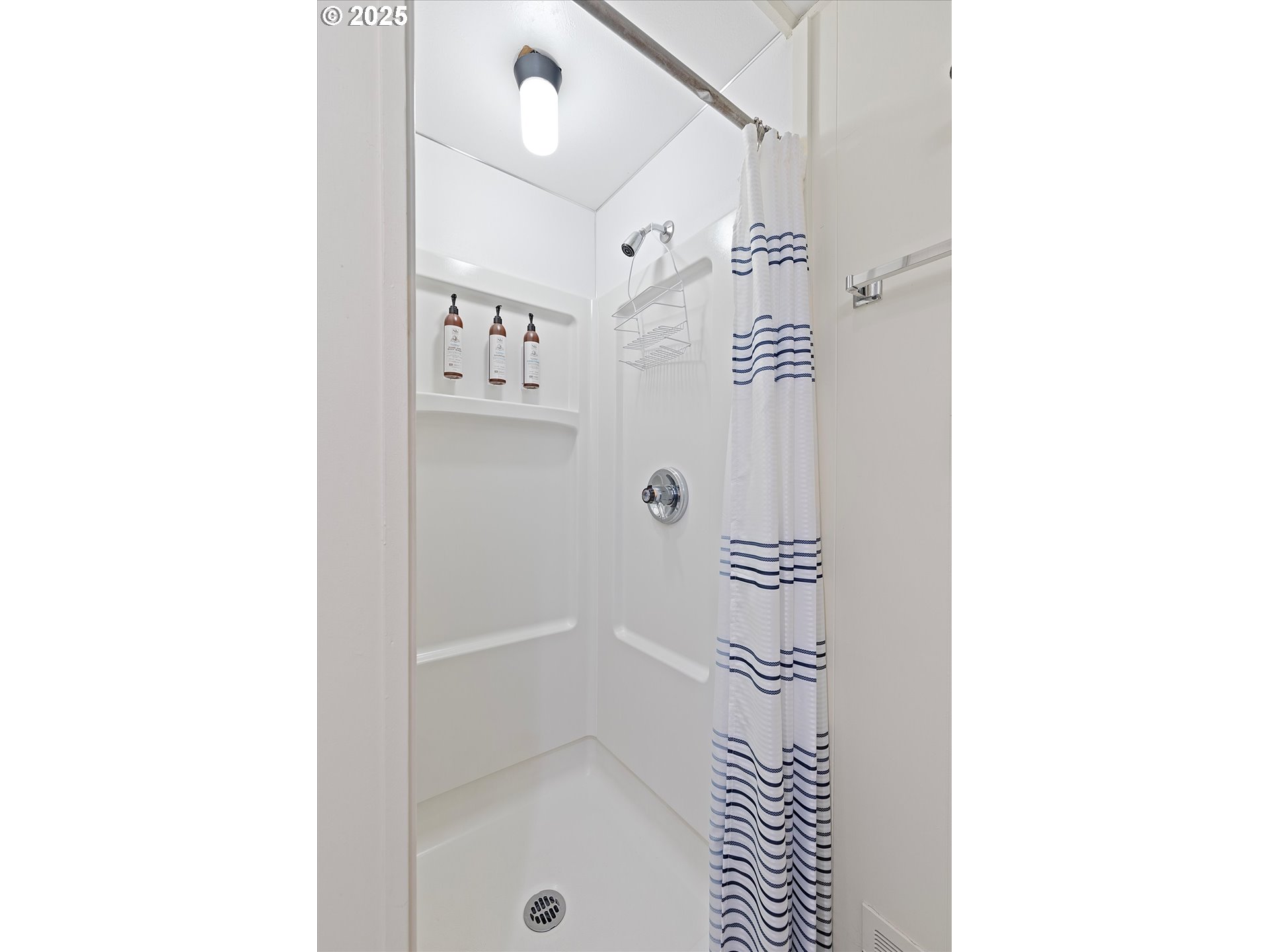 2871 Northeast East Devils Lake Road Otis, OR 97368 - Photo 27 of 48 a bathroom with a shower