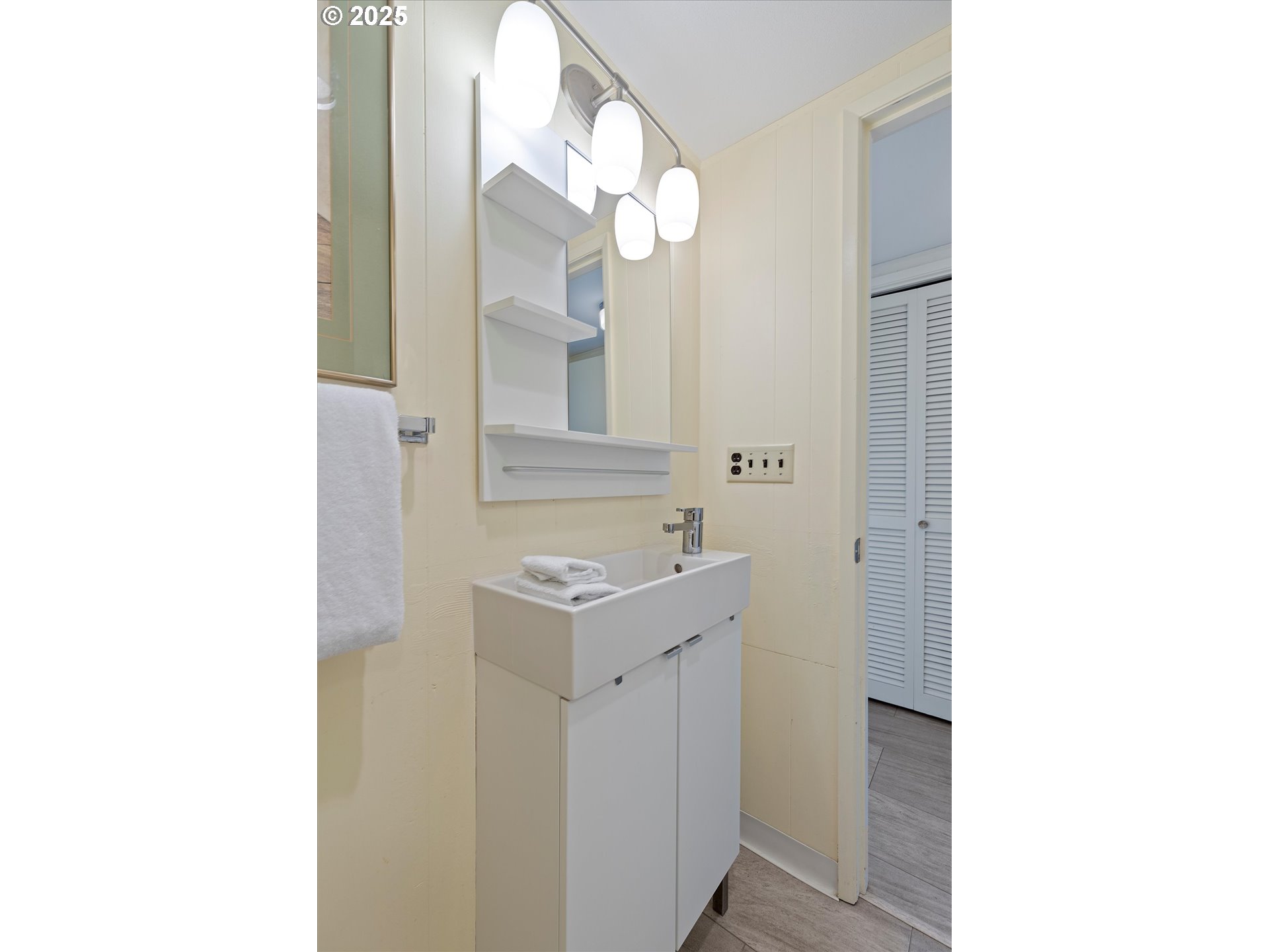 2871 Northeast East Devils Lake Road Otis, OR 97368 - Photo 28 of 48 a bathroom with a sink and a mirror