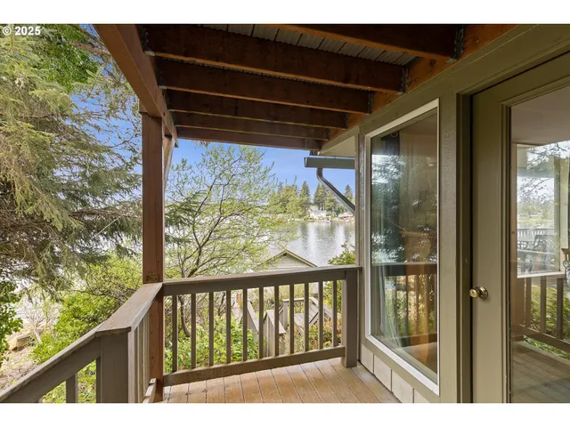 a view of balcony with furniture