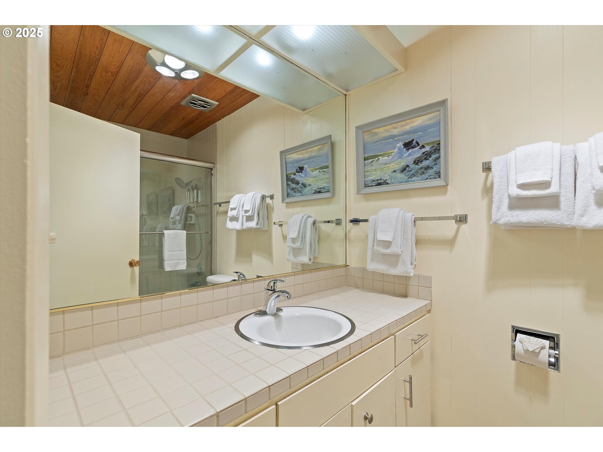 2871 Northeast East Devils Lake Road Otis, OR 97368 - Photo 4 of 48 a bathroom with a sink and a mirror