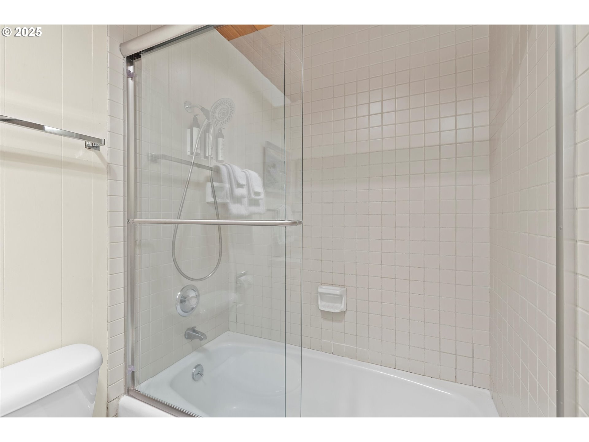 2871 Northeast East Devils Lake Road Otis, OR 97368 - Photo 5 of 48 a bathroom with a shower and toilet