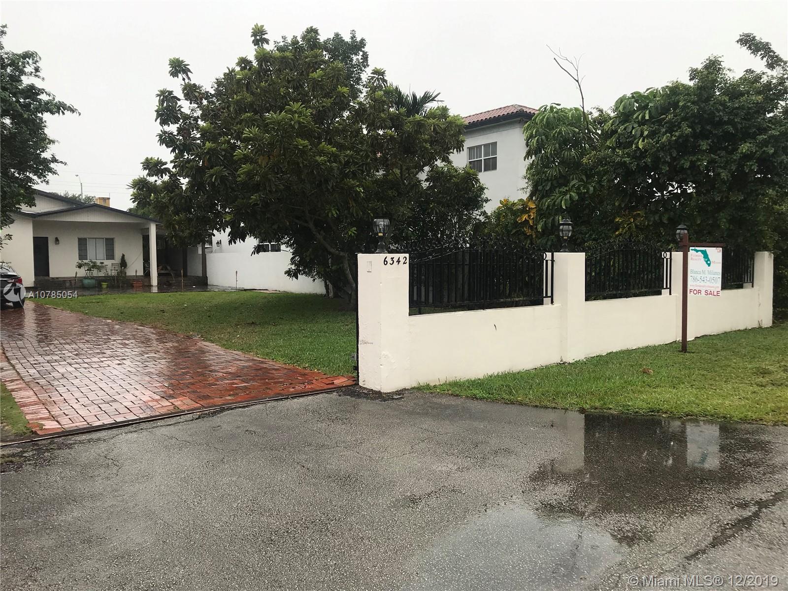 6342 Southwest 23rd Street Miami, FL 33155 - Photo 2 of 37 Exterior Front