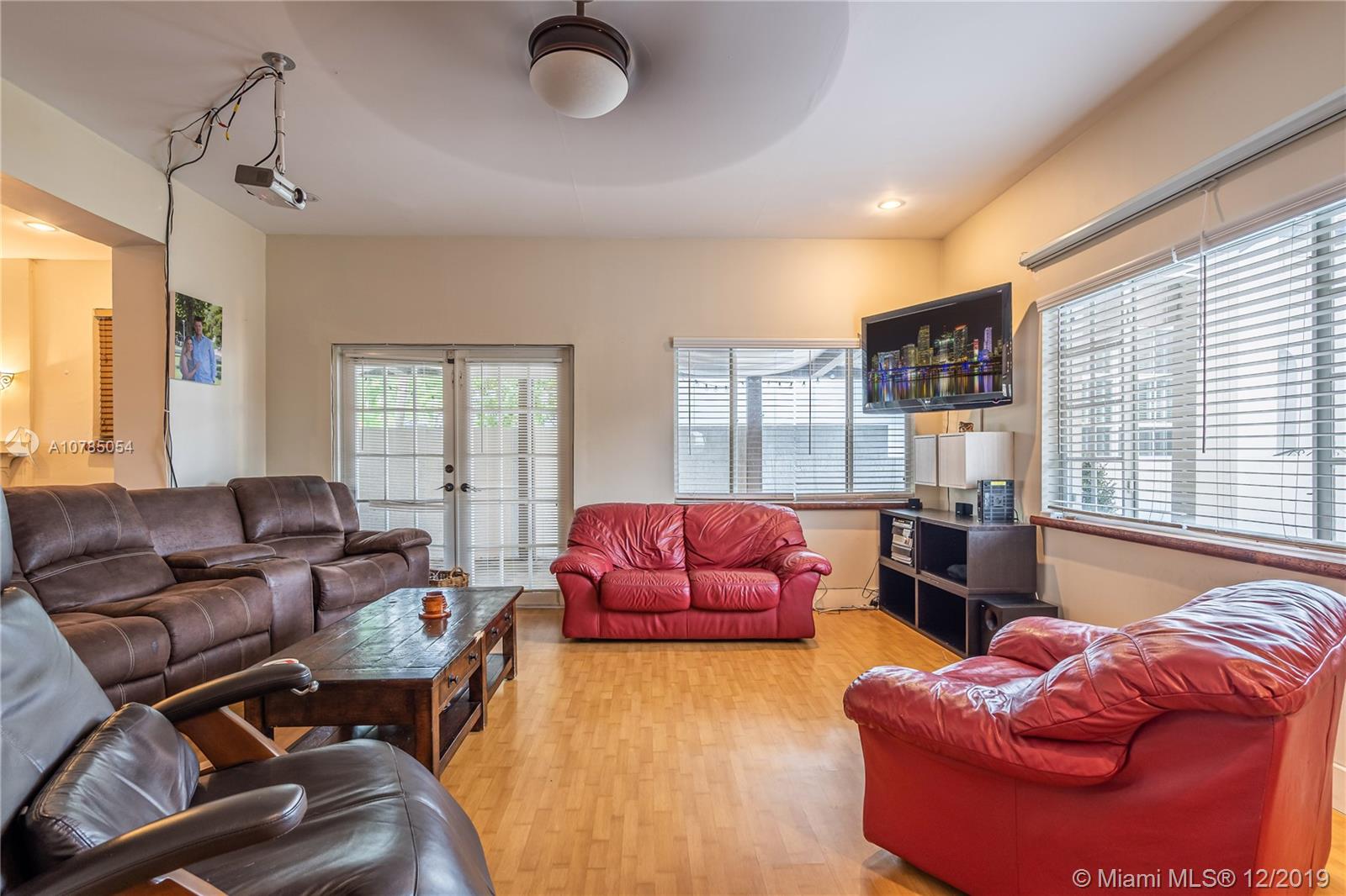 6342 Southwest 23rd Street Miami, FL 33155 - Photo 11 of 37 living room.