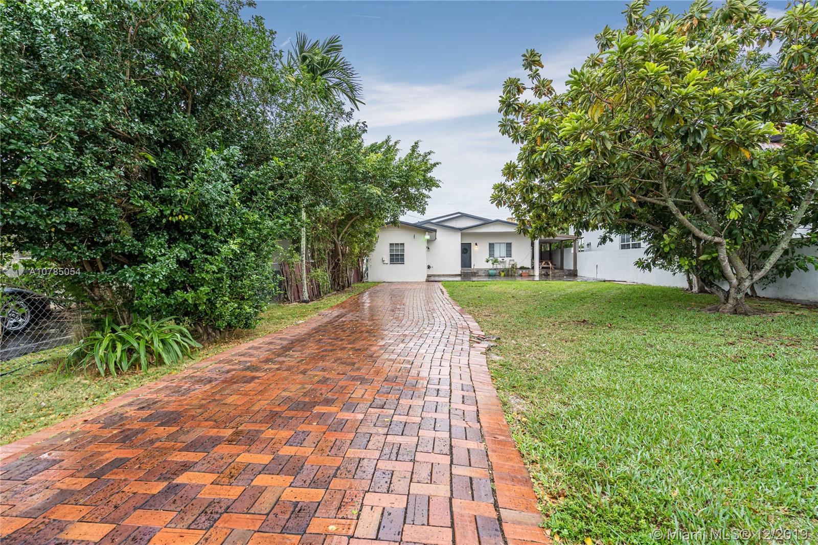 6342 Southwest 23rd Street Miami, FL 33155 - Photo 3 of 37 long driveway to allow multiple cars.