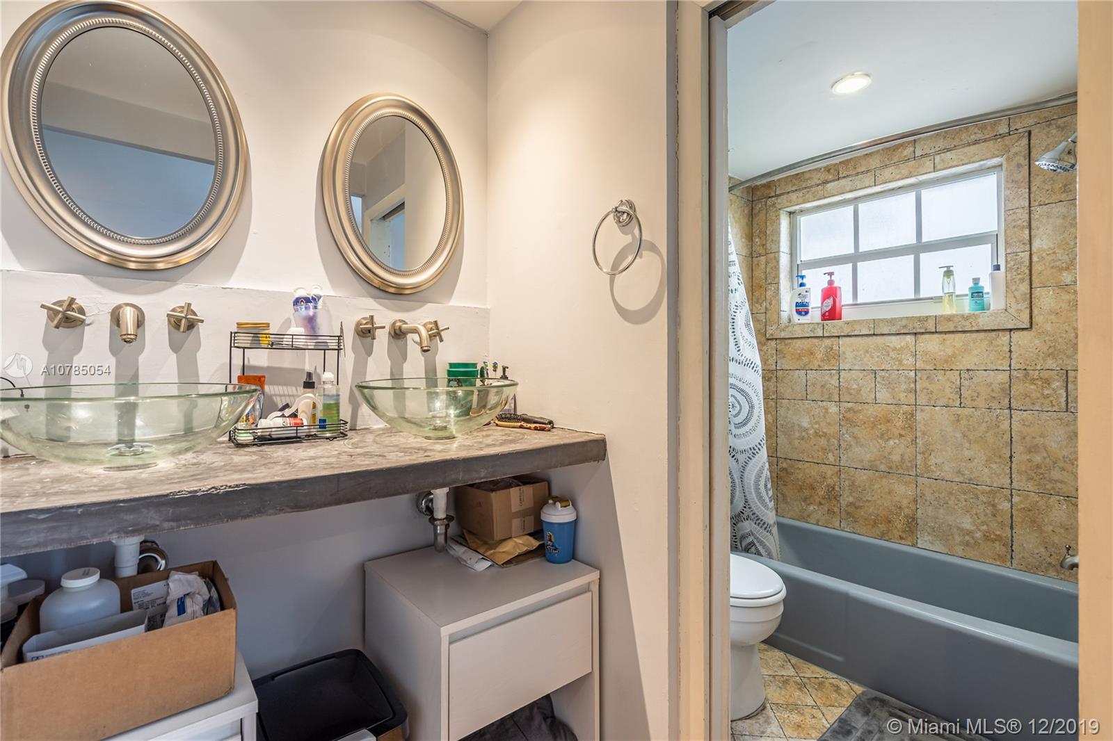 6342 Southwest 23rd Street Miami, FL 33155 - Photo 22 of 37 renovated bathroom.
