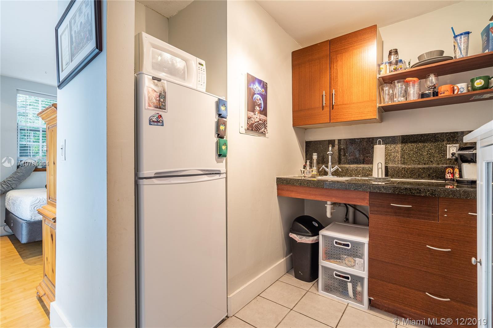 6342 Southwest 23rd Street Miami, FL 33155 - Photo 29 of 37 the apt has a full Bathroom, separated bedroom, pantry area.