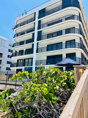 a front view of a multi story residential apartment building
