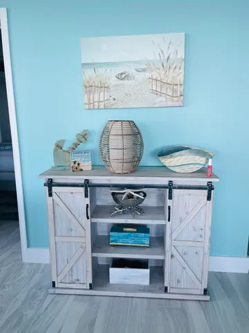 a bed room with a bed and a table