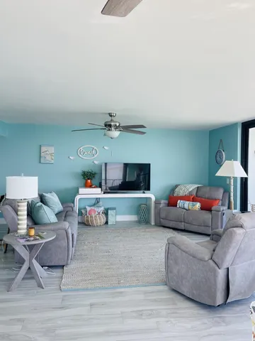 a kitchen with a sink a counter space cabinets and stainless steel appliances