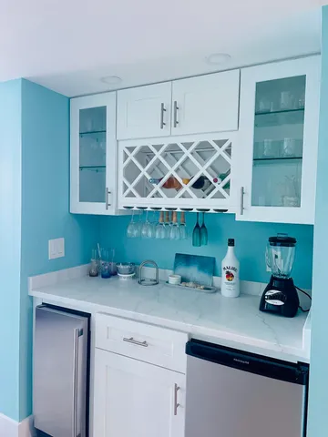 a bedroom with bed and a window