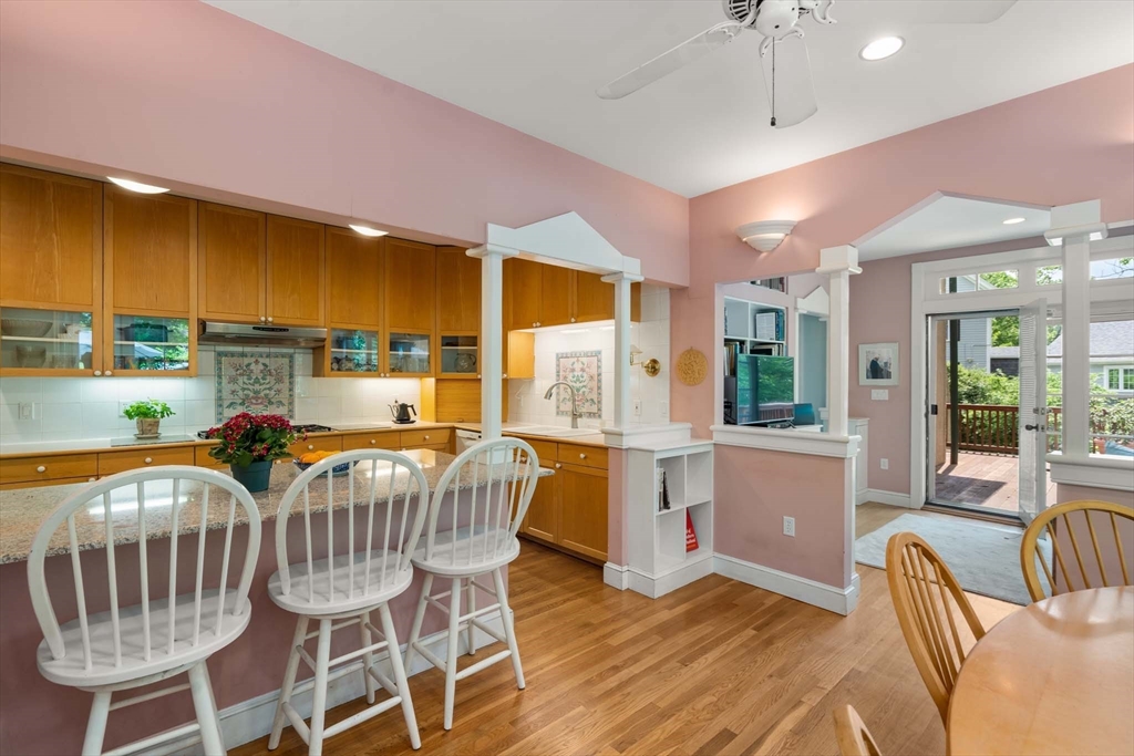 121 Bishopsgate Road Newton, MA 02459 - Photo 12 of 34 a view of a dining room with furniture window and wooden floor