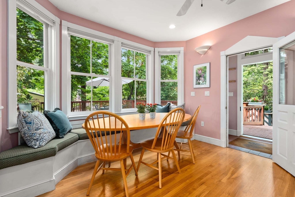 121 Bishopsgate Road Newton, MA 02459 - Photo 13 of 34 a dining room with furniture window and wooden floor