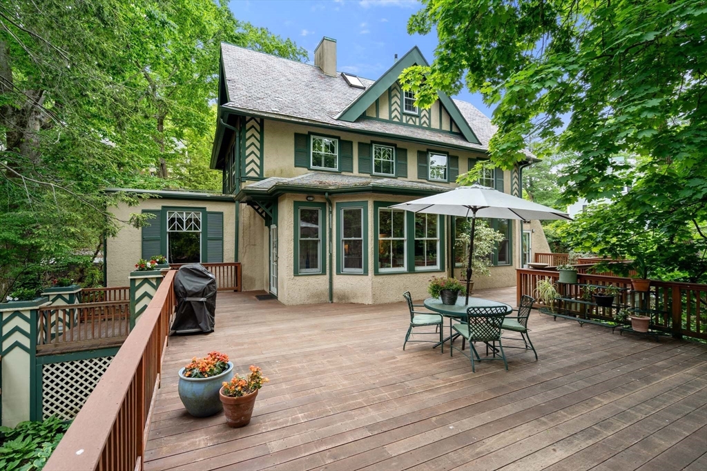 121 Bishopsgate Road Newton, MA 02459 - Photo 24 of 34 a view of a house with sitting area and furniture