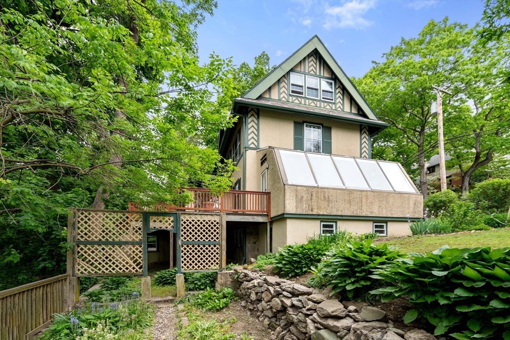 121 Bishopsgate Road Newton, MA 02459 - Photo 25 of 34 a front view of a house with garden