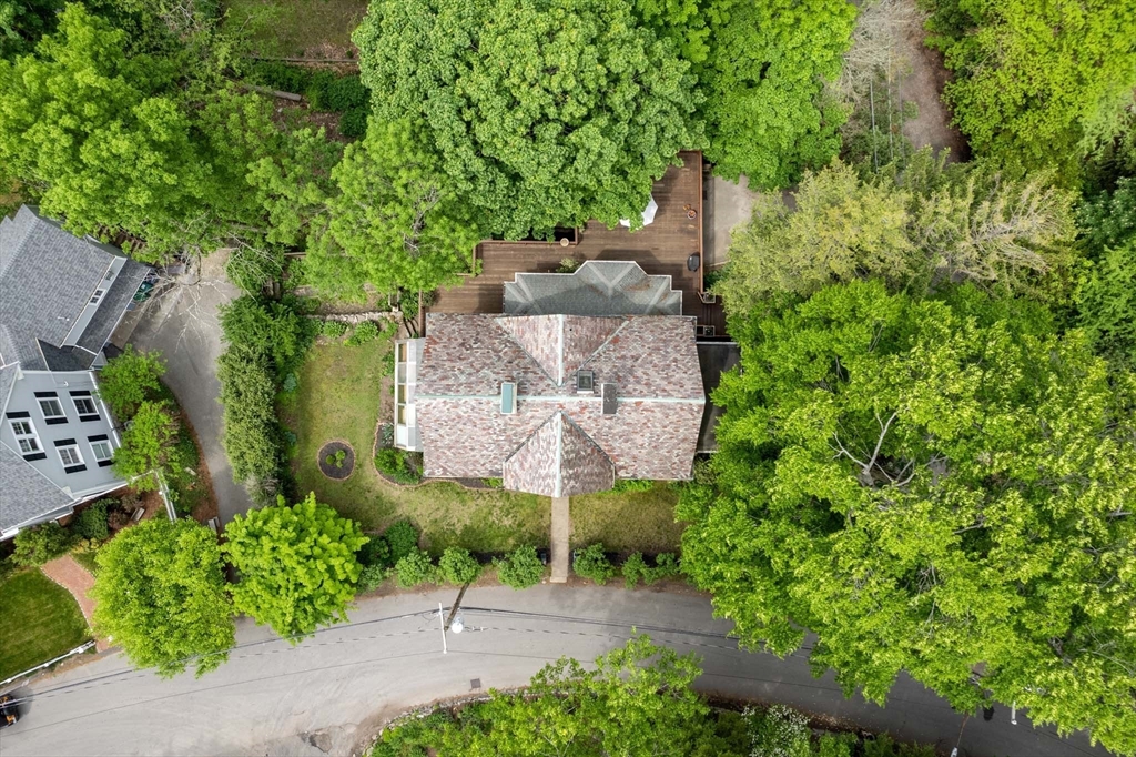 121 Bishopsgate Road Newton, MA 02459 - Photo 30 of 34 an aerial view of a house with a yard and large trees
