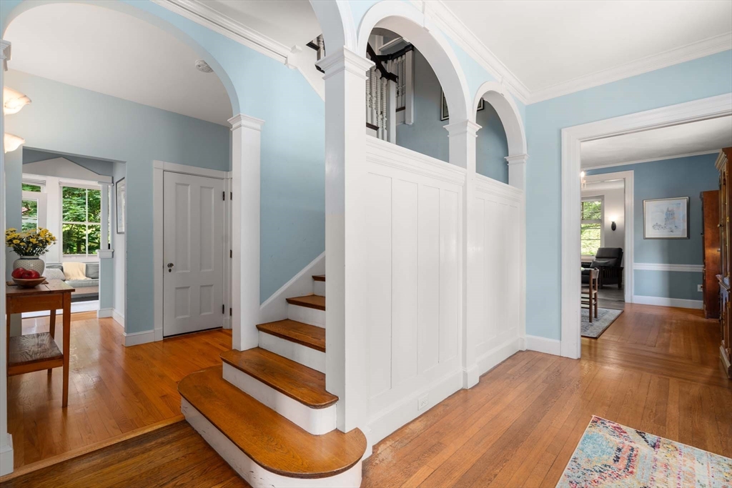 121 Bishopsgate Road Newton, MA 02459 - Photo 5 of 34 wooden floor in a livingroom with wooden floor and a dining room