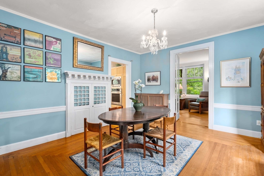 121 Bishopsgate Road Newton, MA 02459 - Photo 8 of 34 a view of a dining room with furniture window and wooden floor