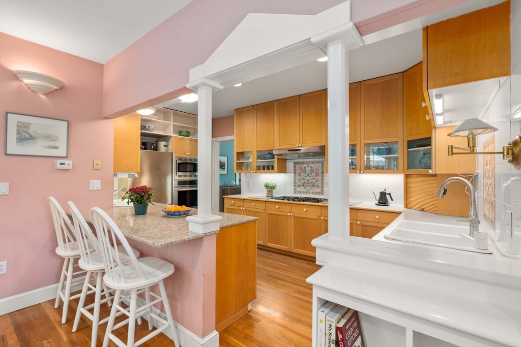 121 Bishopsgate Road Newton, MA 02459 - Photo 10 of 34 a view of a dining room with furniture and a large window