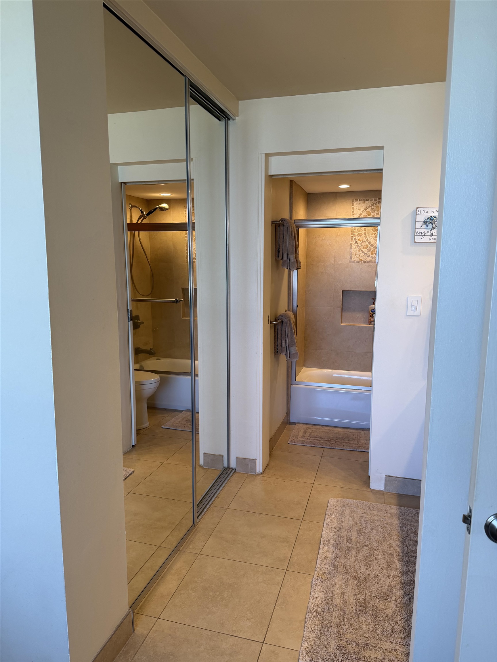 3543 Lower Honoapiilani Road, Unit L202 Lahaina, HI 96761 - Photo 11 of 22 a view of a bathroom from a corridor