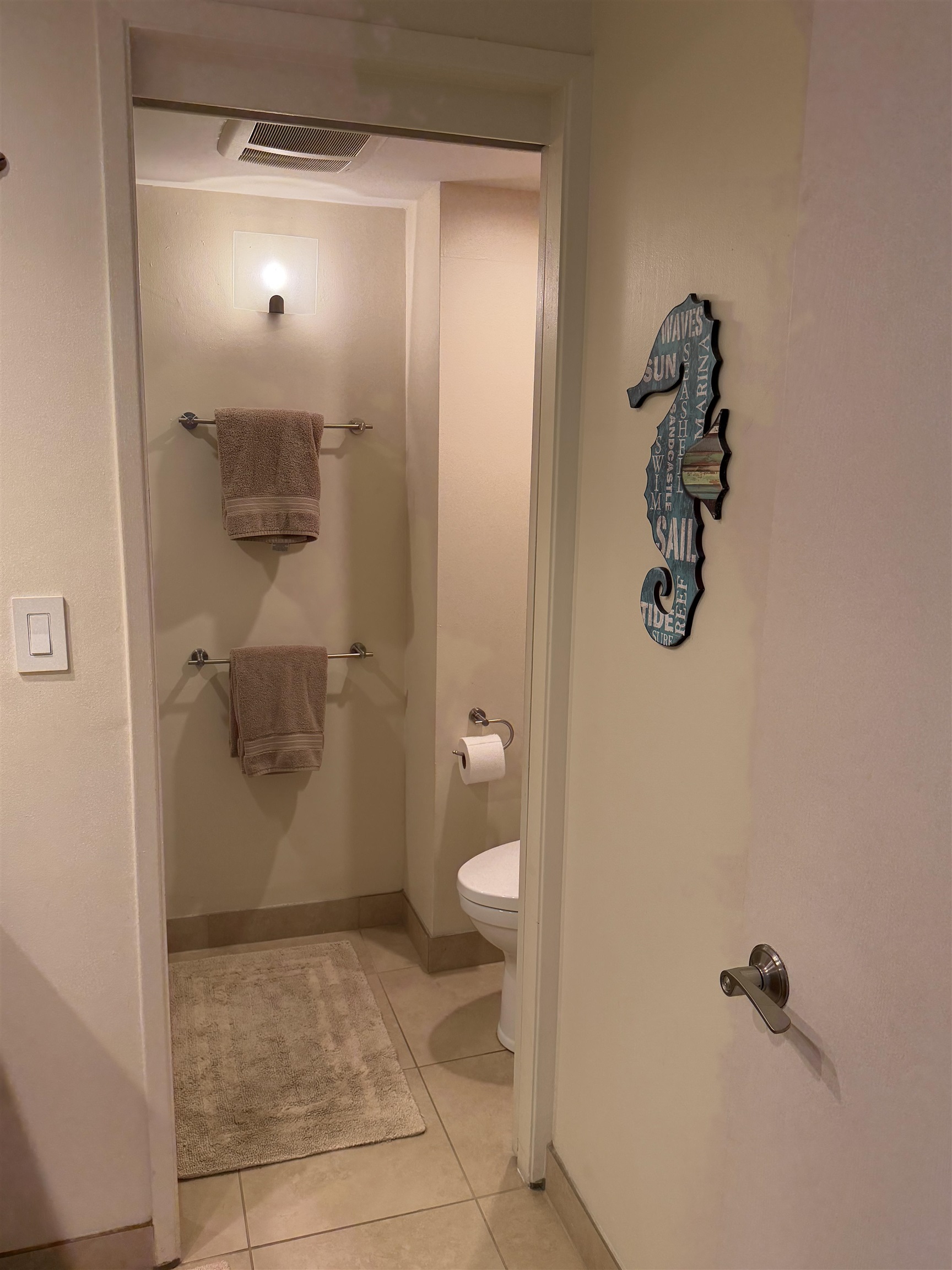 3543 Lower Honoapiilani Road, Unit L202 Lahaina, HI 96761 - Photo 19 of 22 a bathroom with a granite countertop shower and a toilet