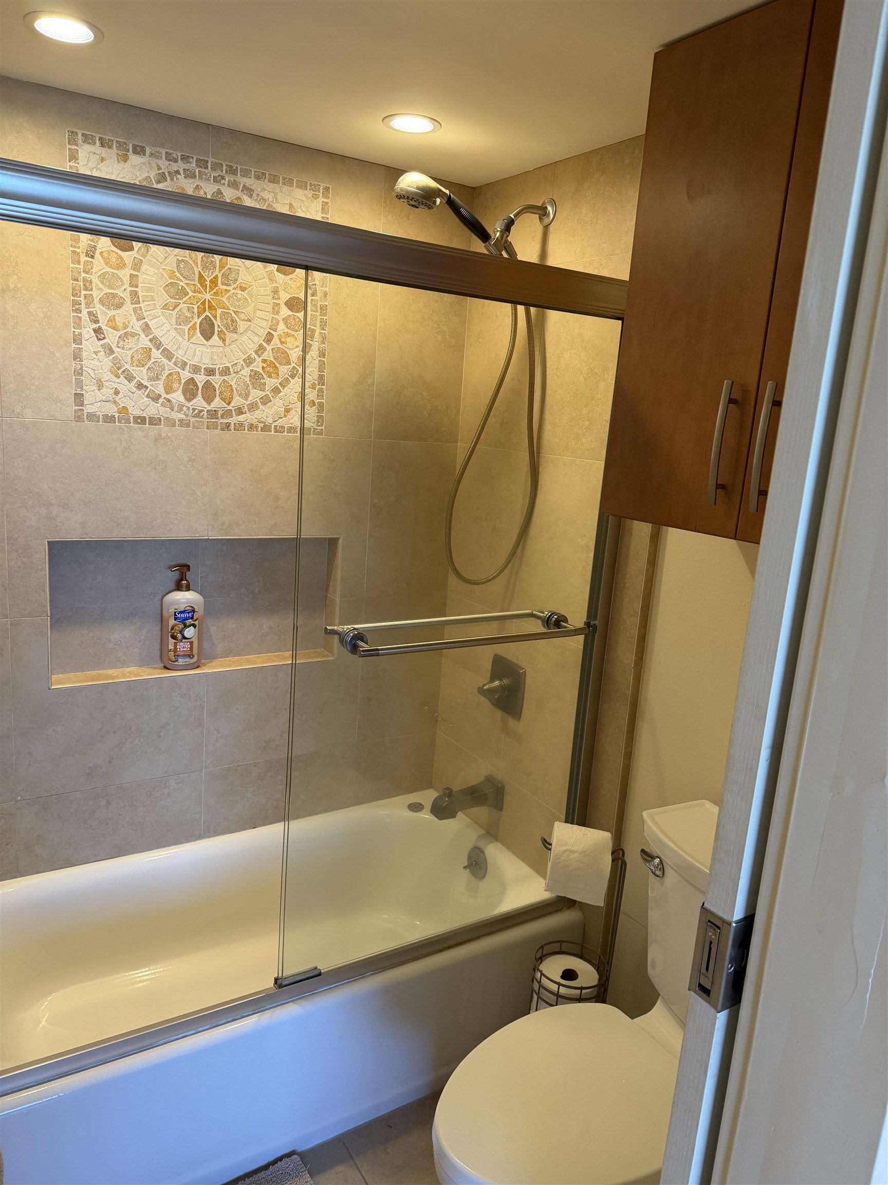 3543 Lower Honoapiilani Road, Unit L202 Lahaina, HI 96761 - Photo 10 of 22 a bathroom with a sink mirror bathtub and toilet